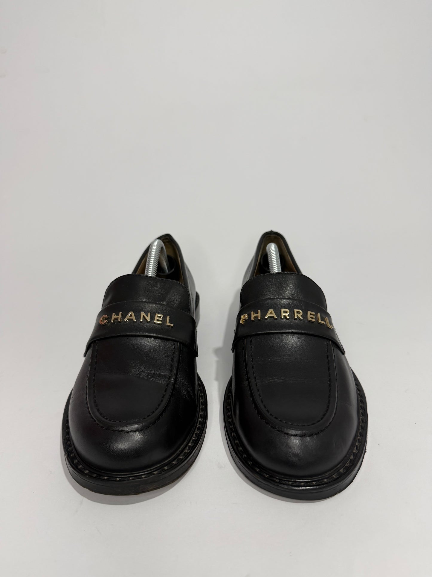 CHANEL x Pharrell Black Leather Logo Loafers Gold Hardware EU 38C