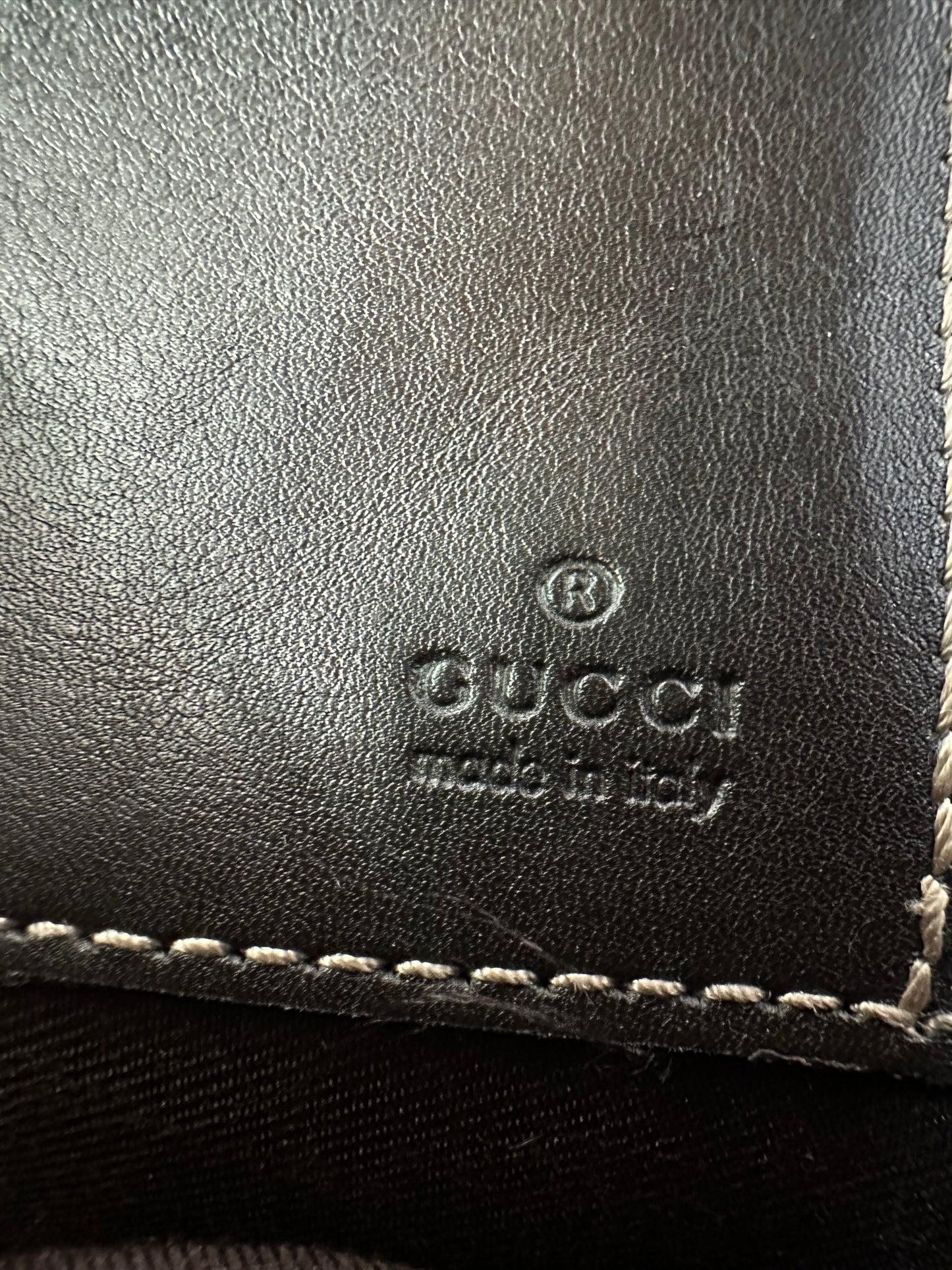 GUCCI 
GG Supreme Monogram Clutch Document Holder Brown