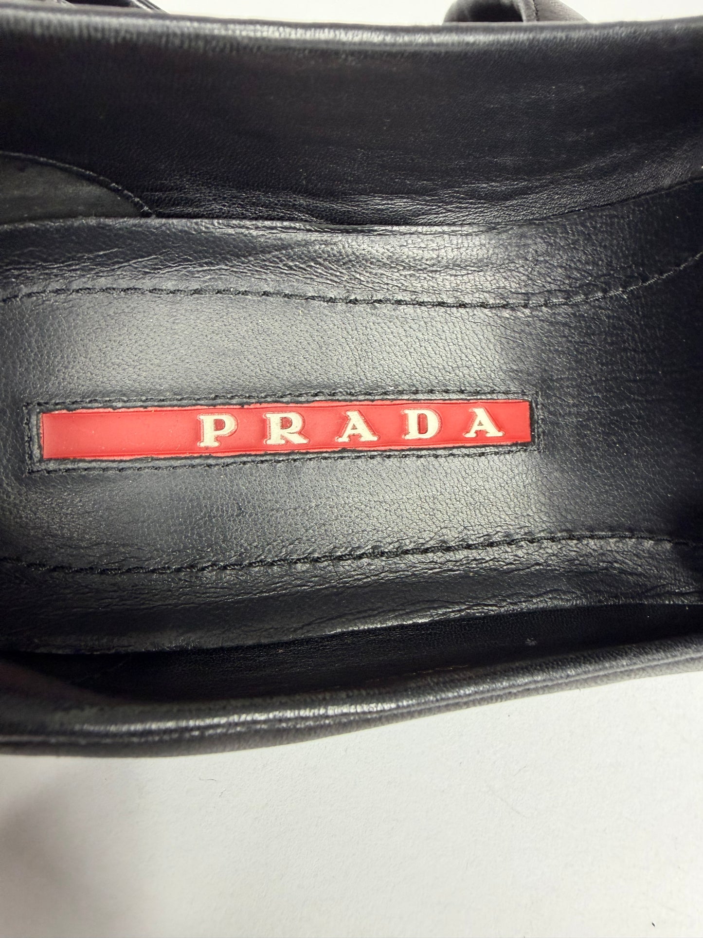PRADA
Sport Black Nappa Leather Loafers Size 39.5 EU/ 6.5 UK/ 7.5 US