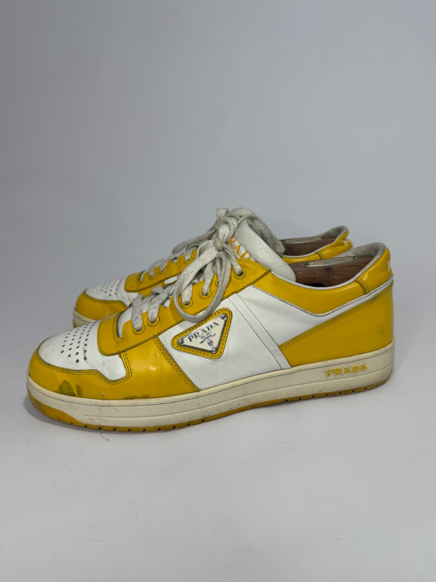 Prada
Enameled Metal Triangle Leather Sneakers