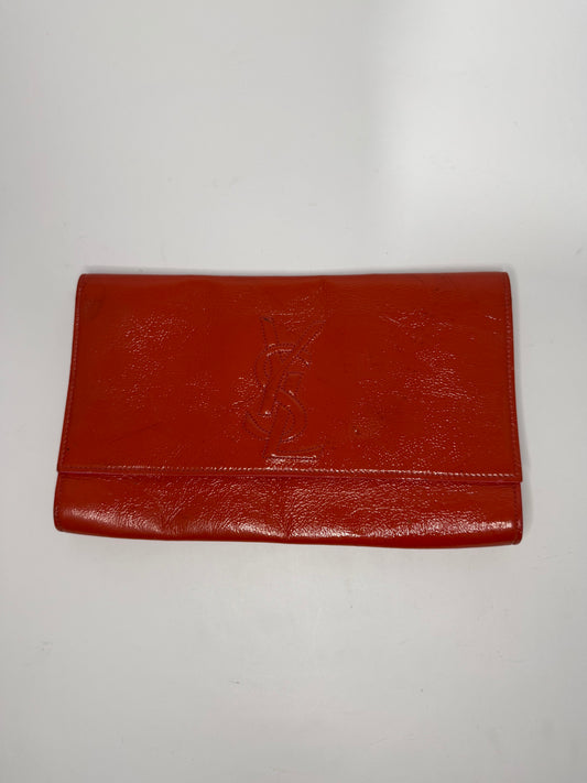YVES SAINT LAURENT
Dark Orange Patent Leather Belle De Jour Large Clutch Bag