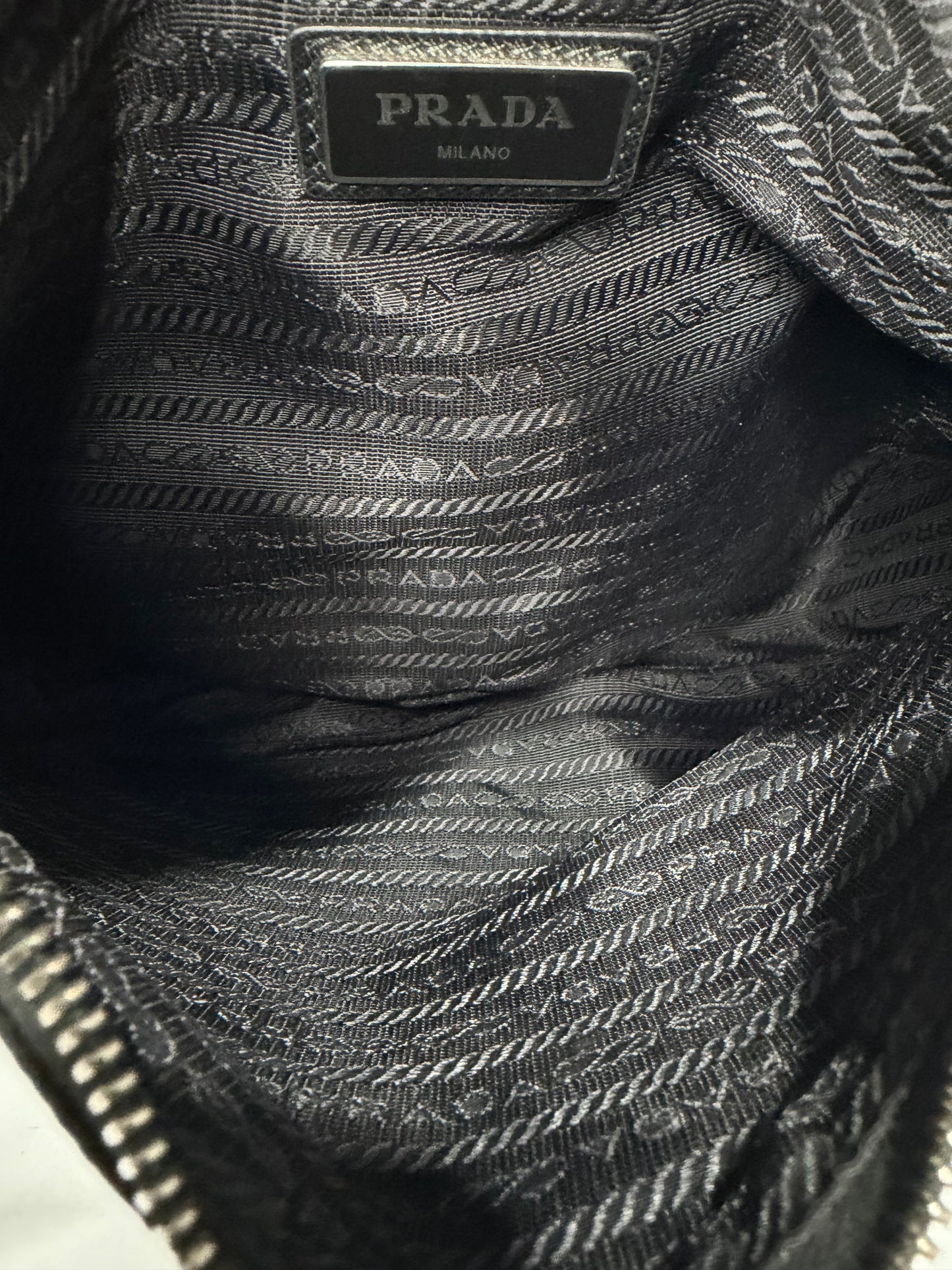 Certified Authentic
PRADA
Re-Nylon Saffiano Re-Edition 2000 Double Zip Crossbody Bag Black