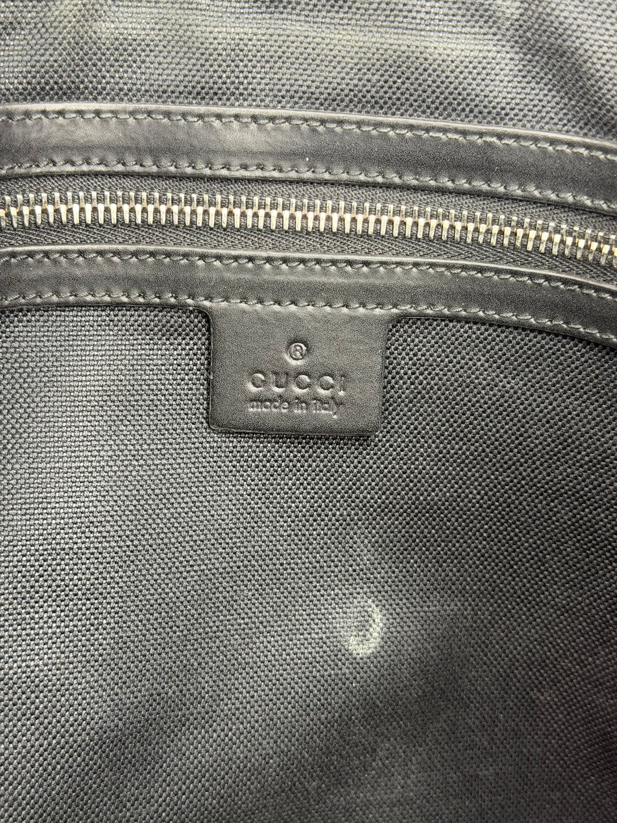 GUCCI
GG Supreme Clutch Bag