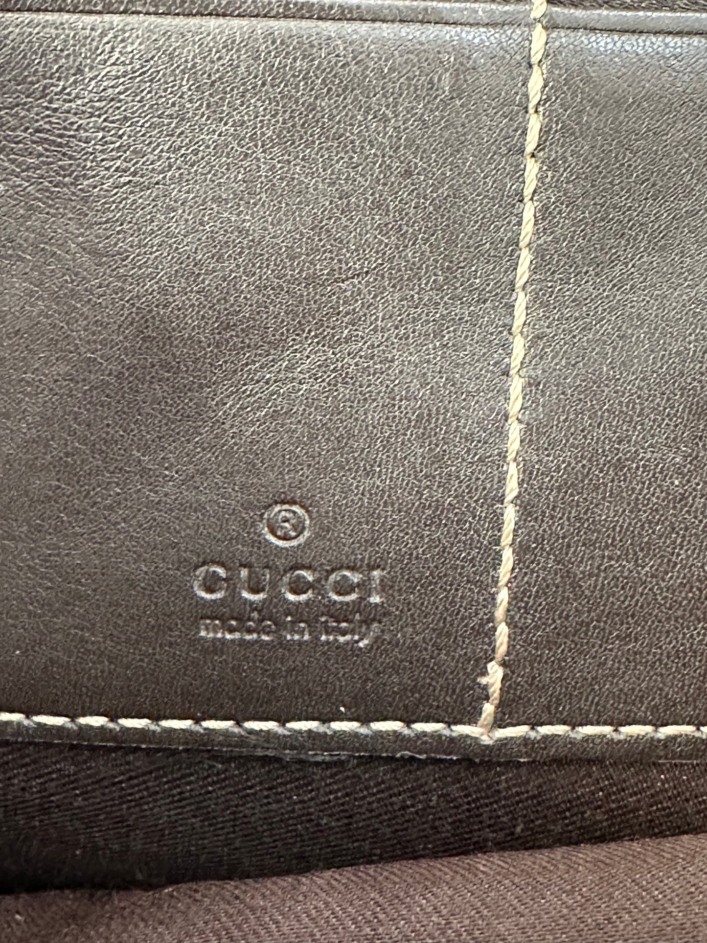 GUCCI 
GG Supreme Monogram Clutch Document Holder Brown