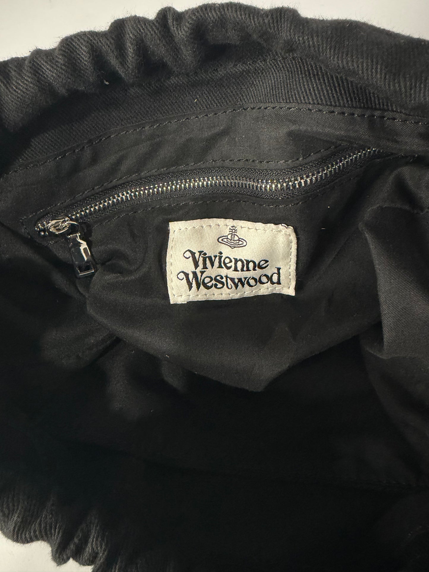 Vivienne Westwood Hilary 
drawstring clutch bag