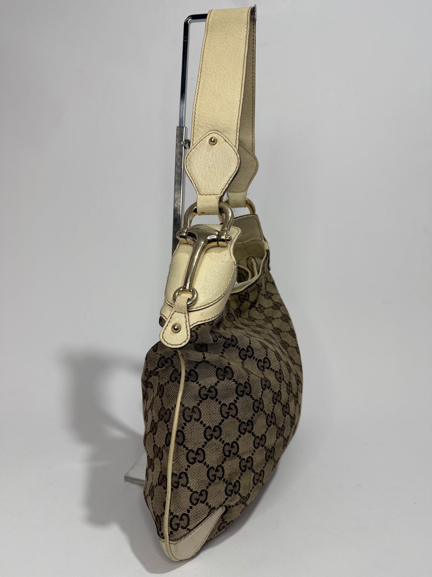 GUCCI
Beige/White GG Canvas Horsebit Creole Hobo Bag