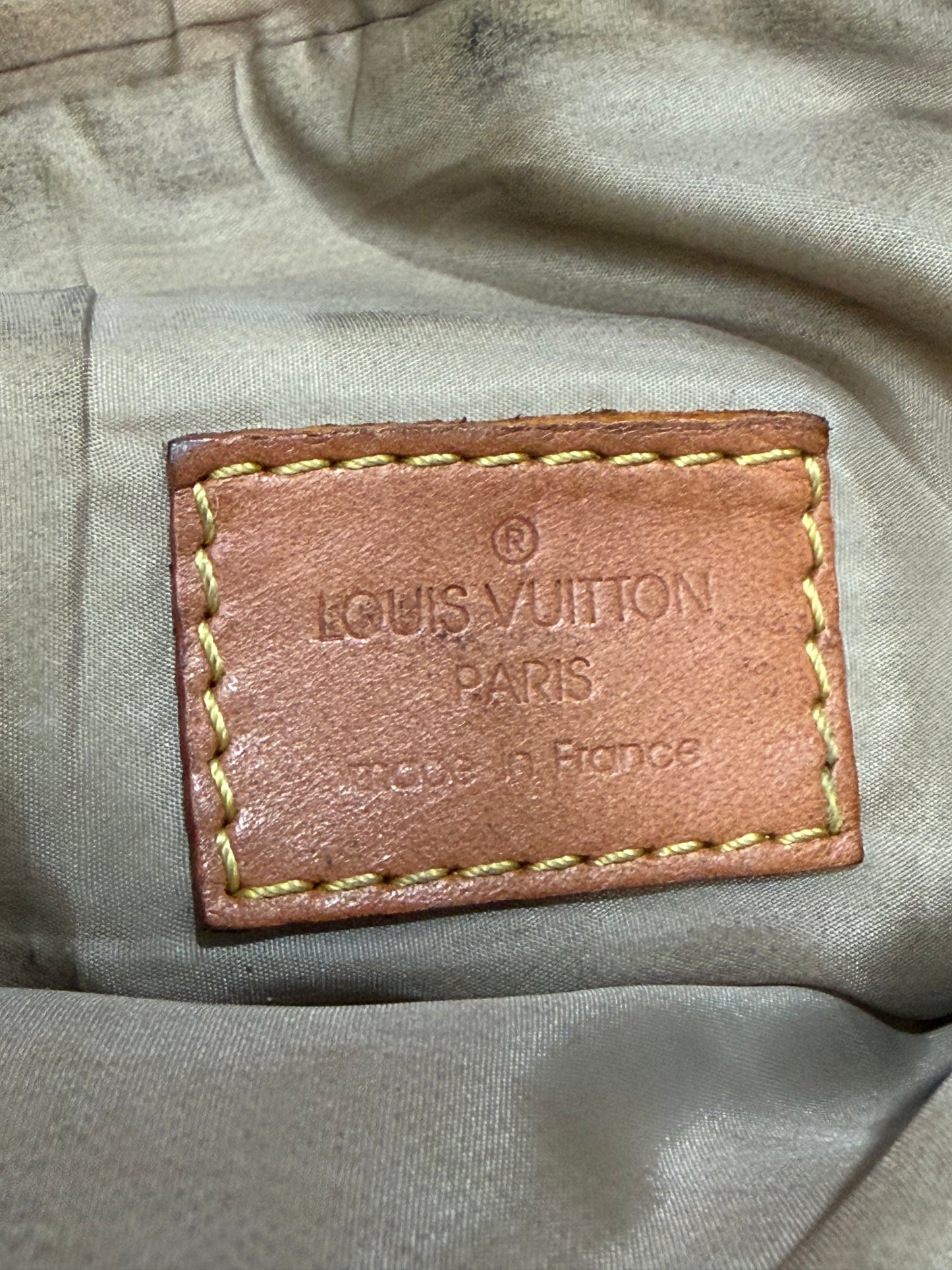 LOUIS VUITTON
Terre Damier Geant Vertical Messenger Bag
