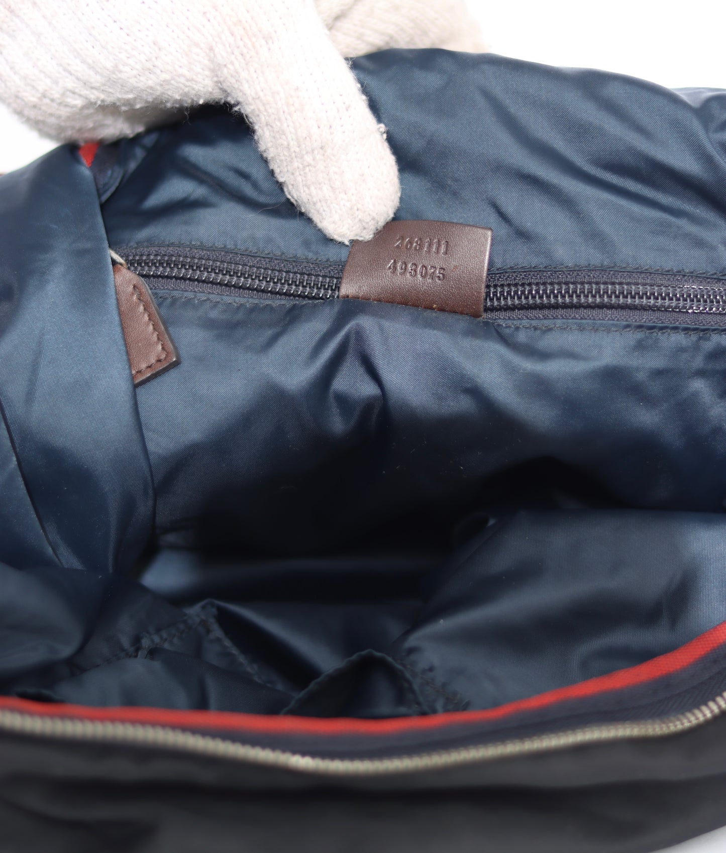 GUCCI
Blue Diamente Nylon Stripe Backpack Bag