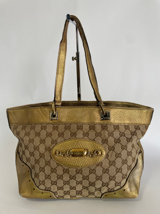 GUCCI
Monogram Large Punch Tote Gold