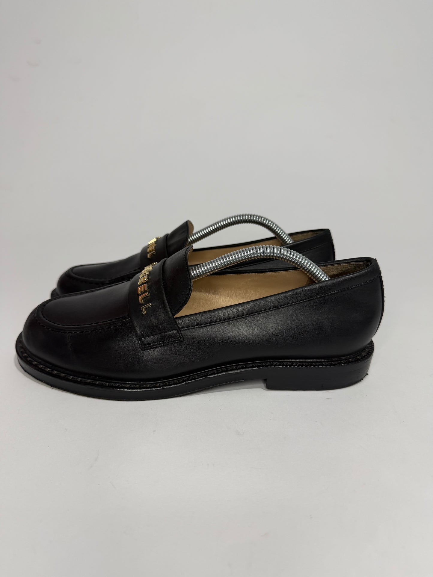 CHANEL x Pharrell Black Leather Logo Loafers Gold Hardware EU 38C