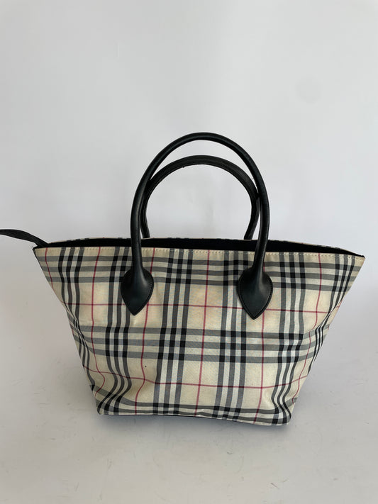 Burberry Pre-Owned
2000s House Check small zipped handbag