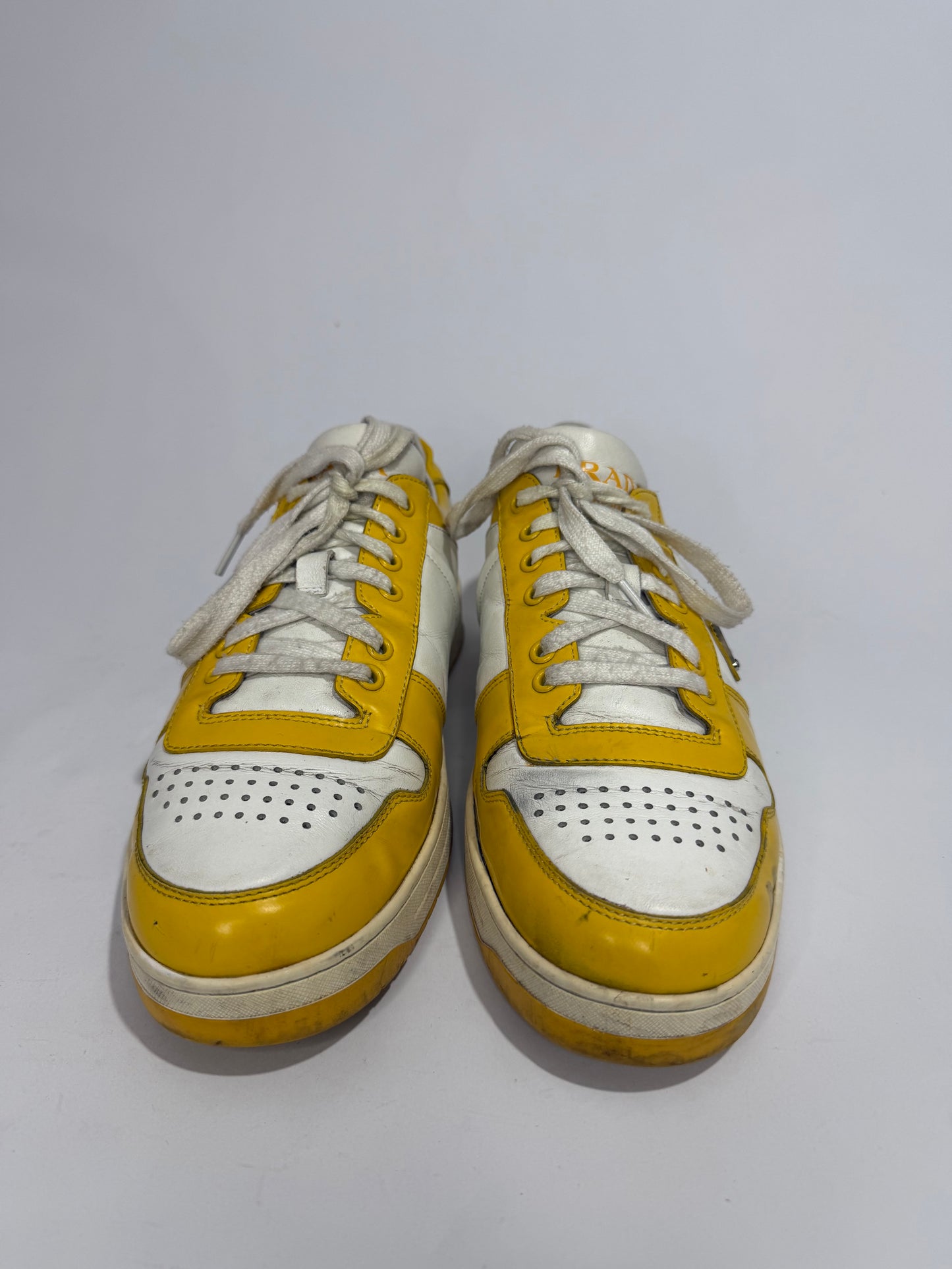 Prada
Enameled Metal Triangle Leather Sneakers