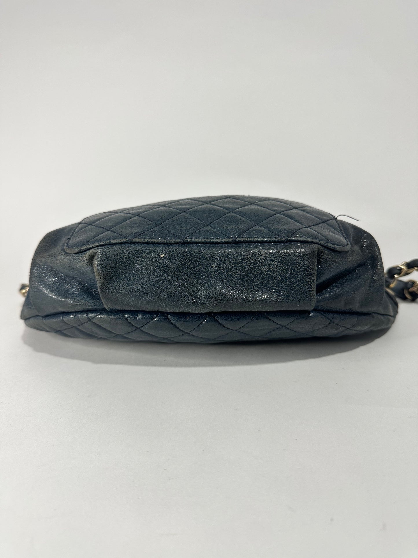 CHANEL
Blue Quilted Caviar Leather Waist Belt Bag