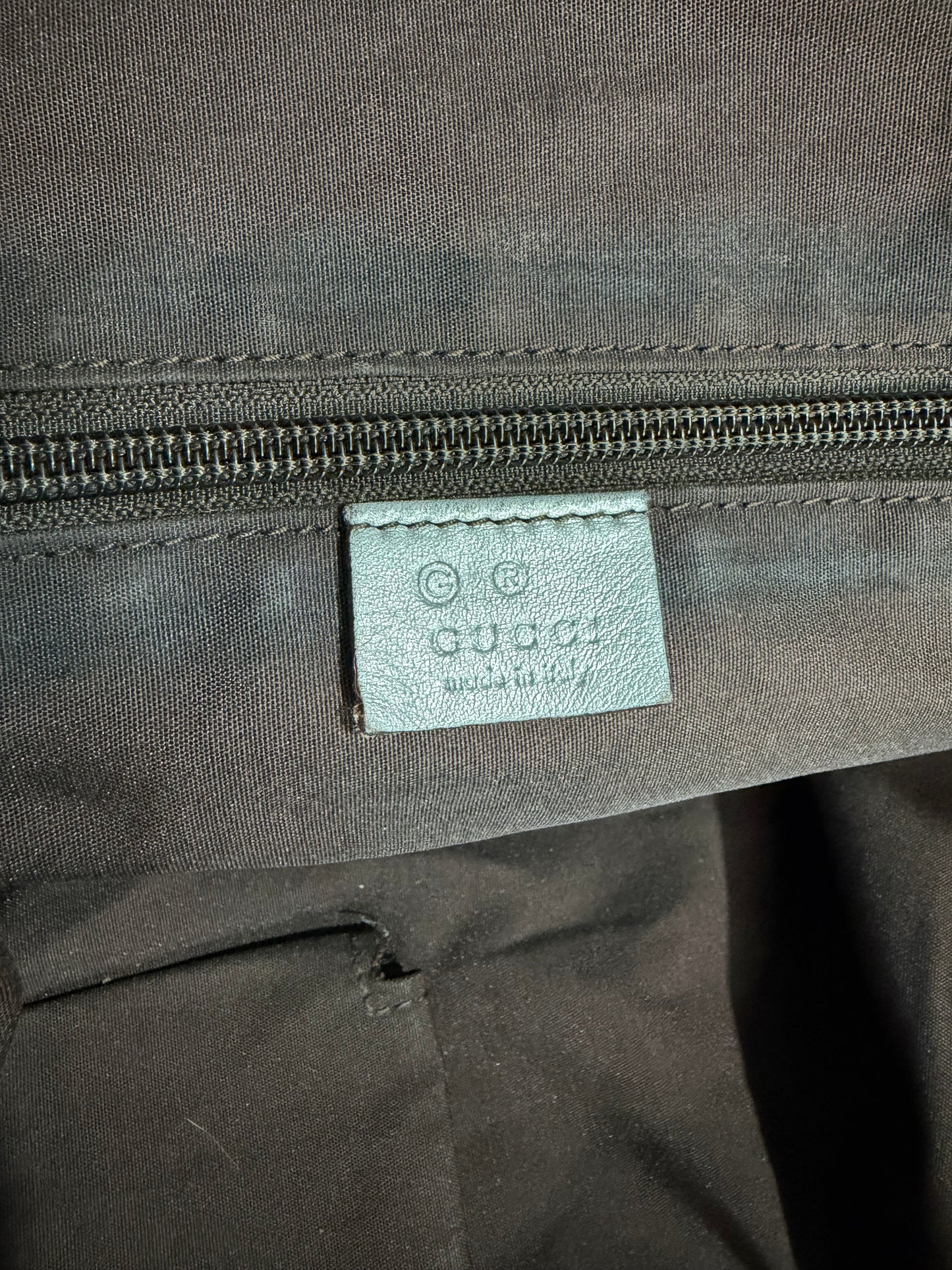 GUCCI
Metallic Silver GG Canvas Travel Tote