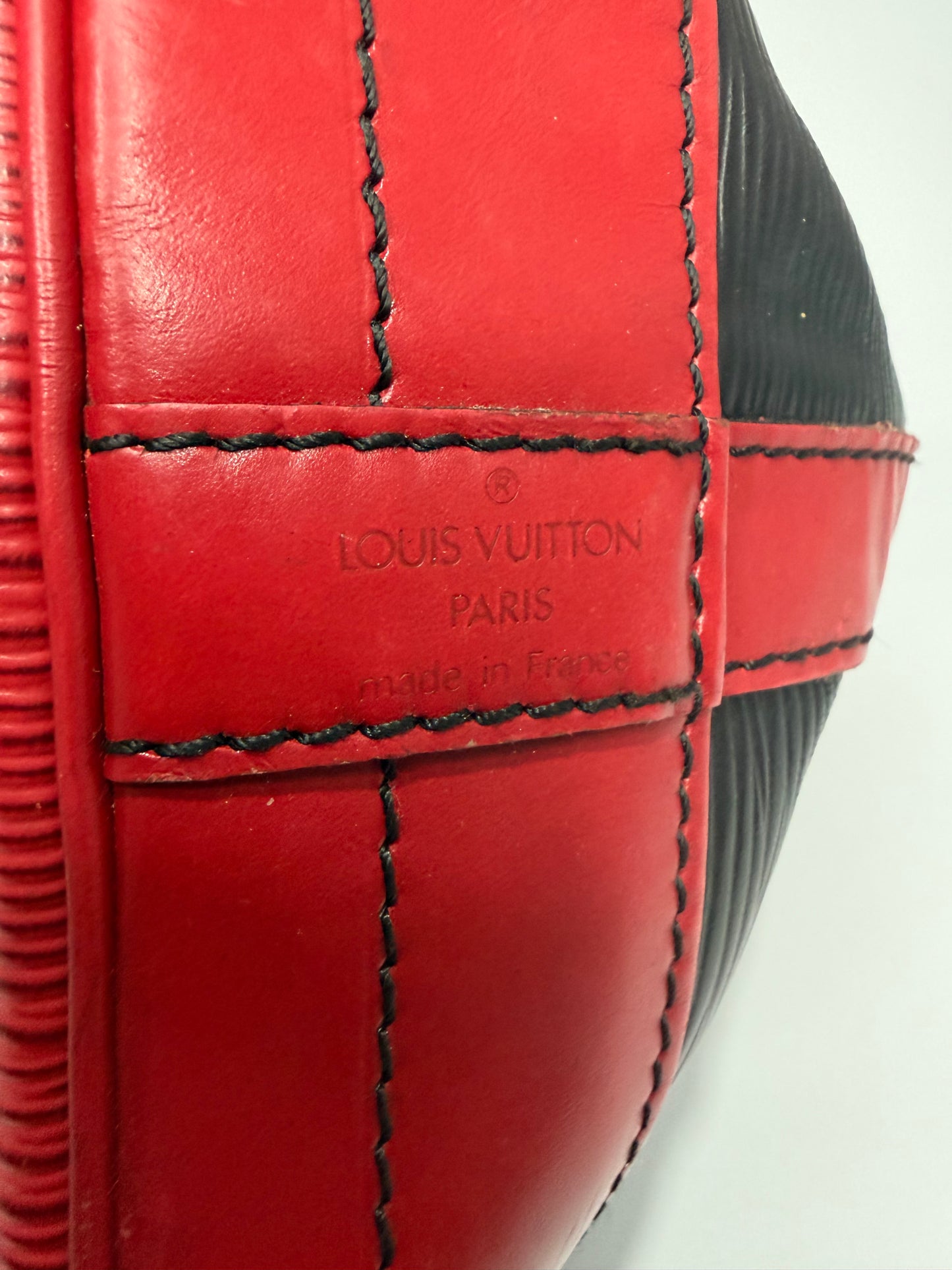 LOUIS VUITTON
Black/Castilian Red Epi Leather Large Noe Bag