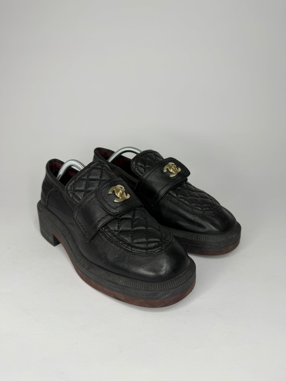 CHANEL
Lambskin Quilted CC Turnlock Loafers Black Size 38 EU/ 8 US/ 5 UK