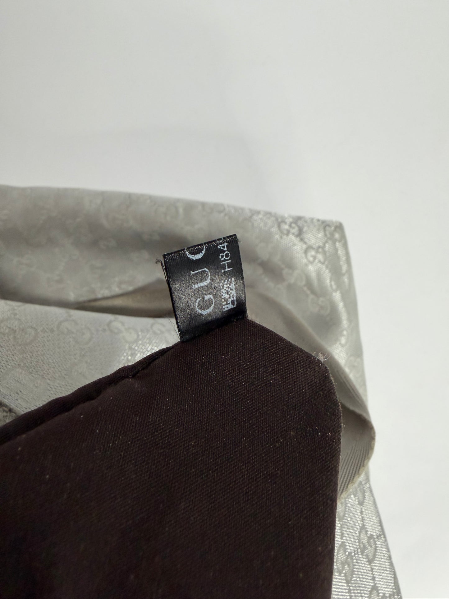 GUCCI
Metallic Silver GG Canvas Travel Tote