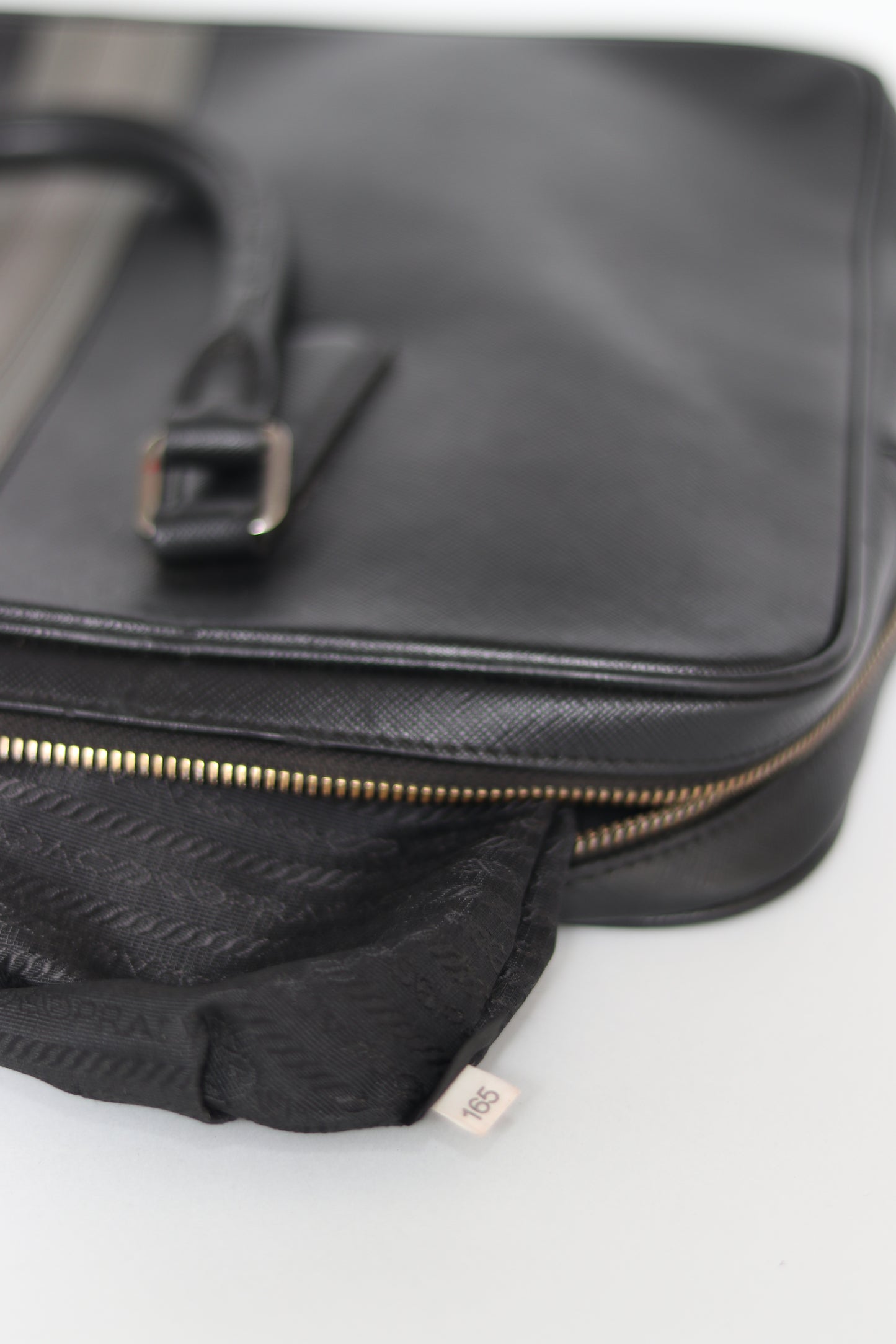 Prada
Black Saffiano Lux Briefcase