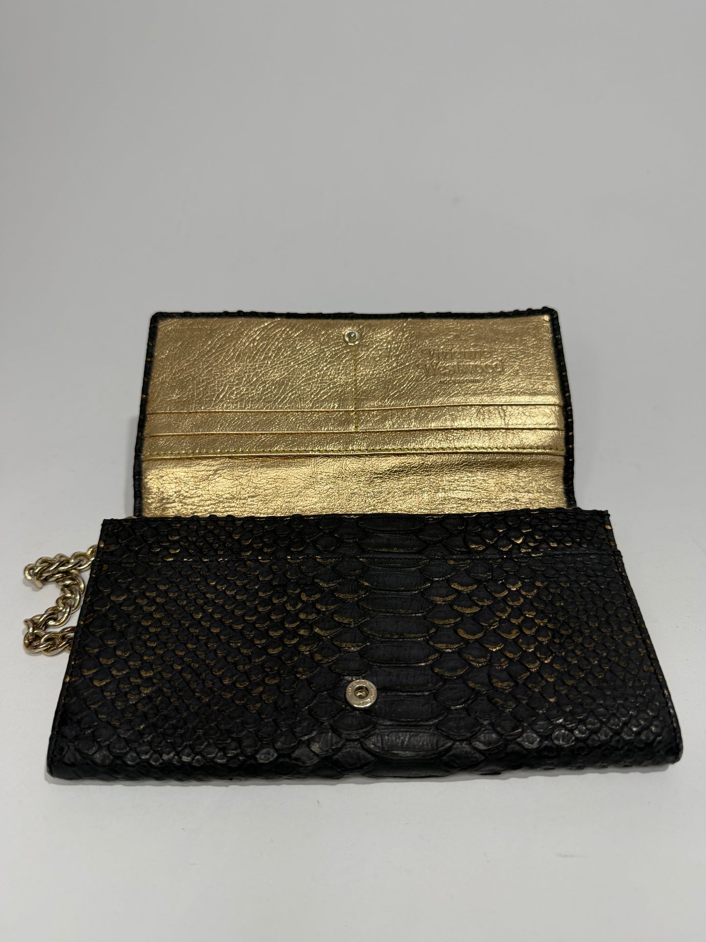 VIVIENNE WESTWOOD
Frilly Snake Patent Wallet In Black
