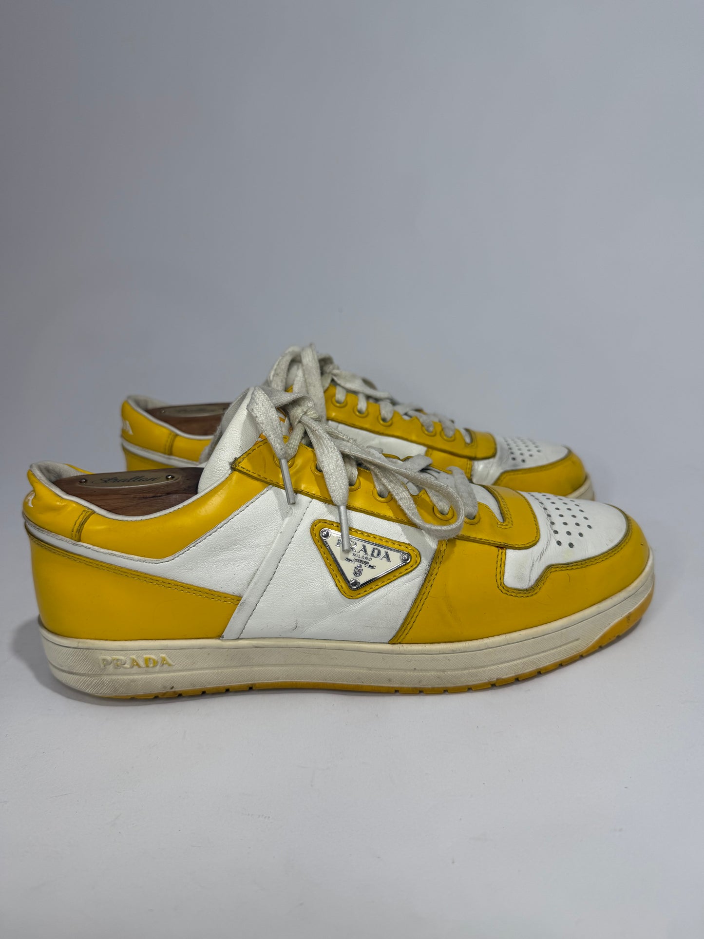 Prada
Enameled Metal Triangle Leather Sneakers