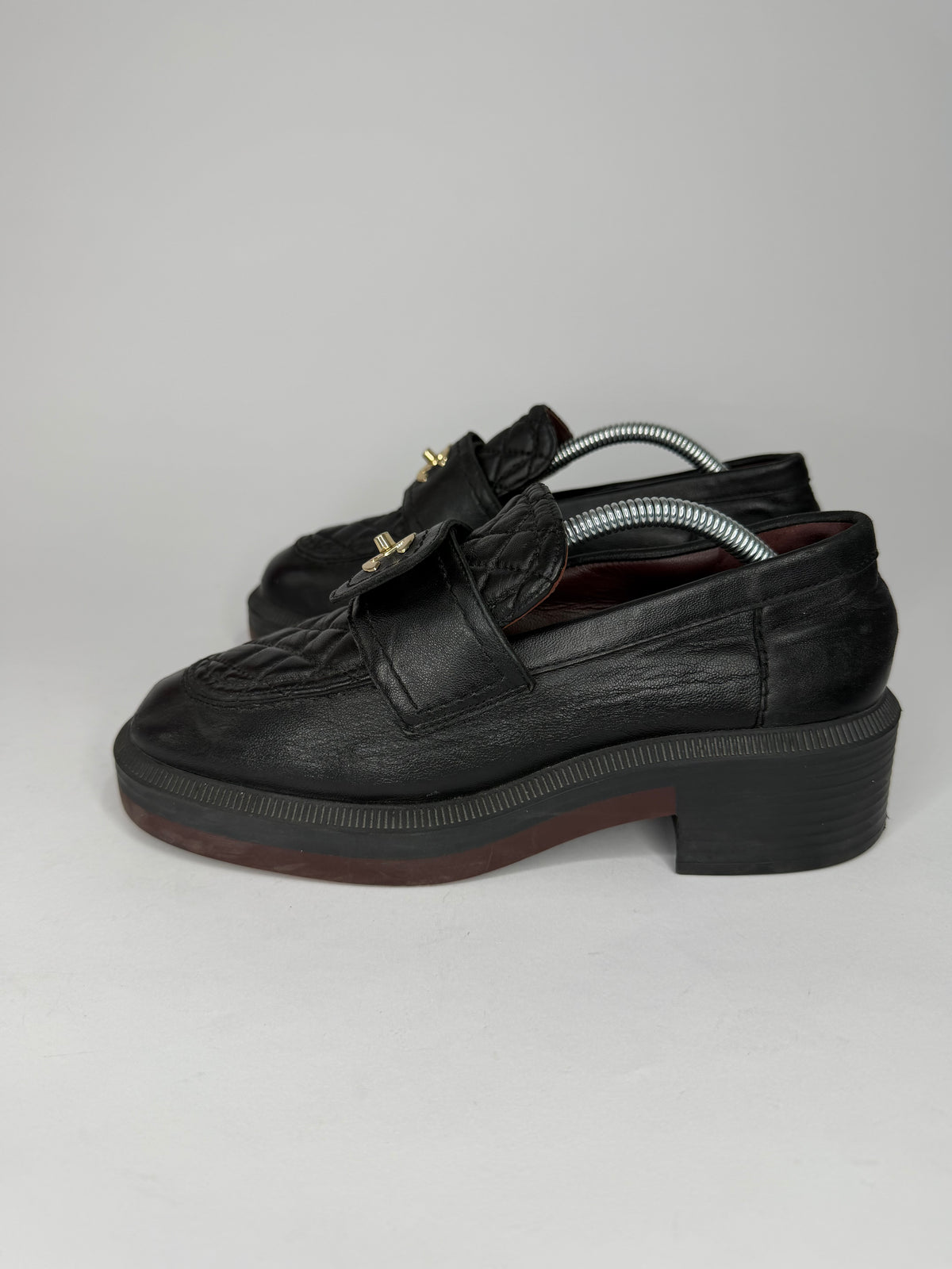 CHANEL
Lambskin Quilted CC Turnlock Loafers Black Size 38 EU/ 8 US/ 5 UK
