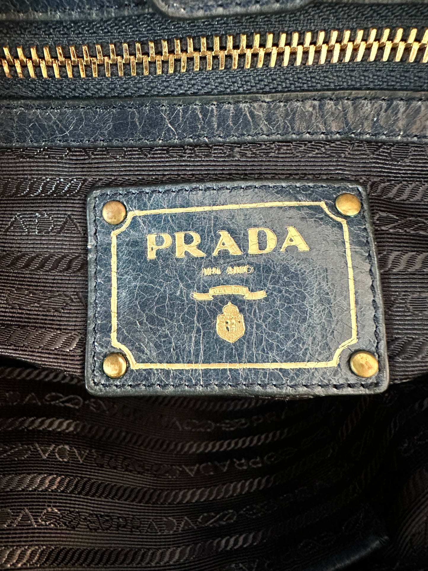 PRADA
Denim Blue Vitello Shine Leather Bauletto Bag