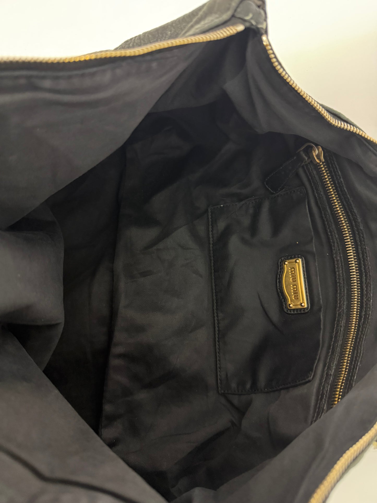 Miu Miu
Leather Weekender Bag