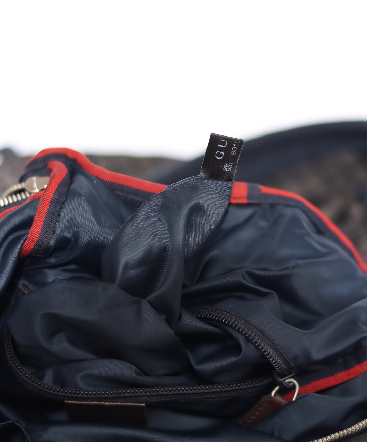 GUCCI
Blue Diamente Nylon Stripe Backpack Bag