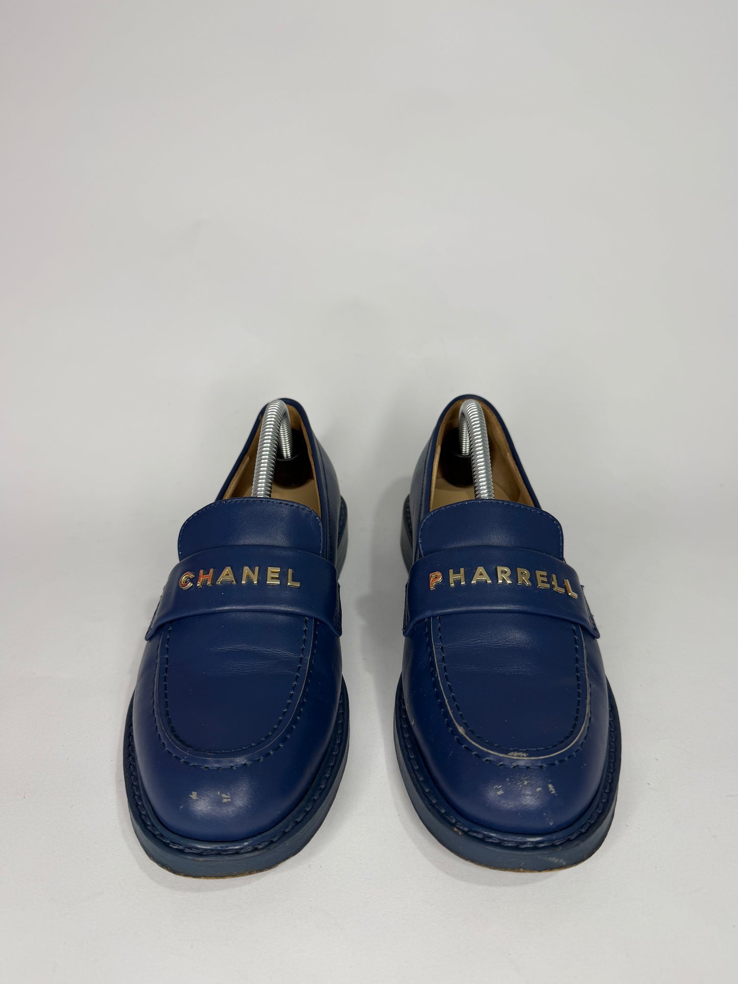 CHANEL
X PHARRELL Leather Slip-On Loafers Blue - Limited Edition