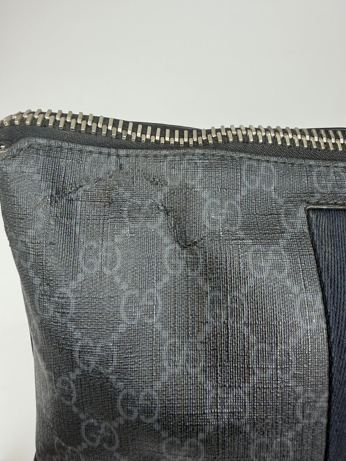GUCCI
GG Supreme Clutch Bag