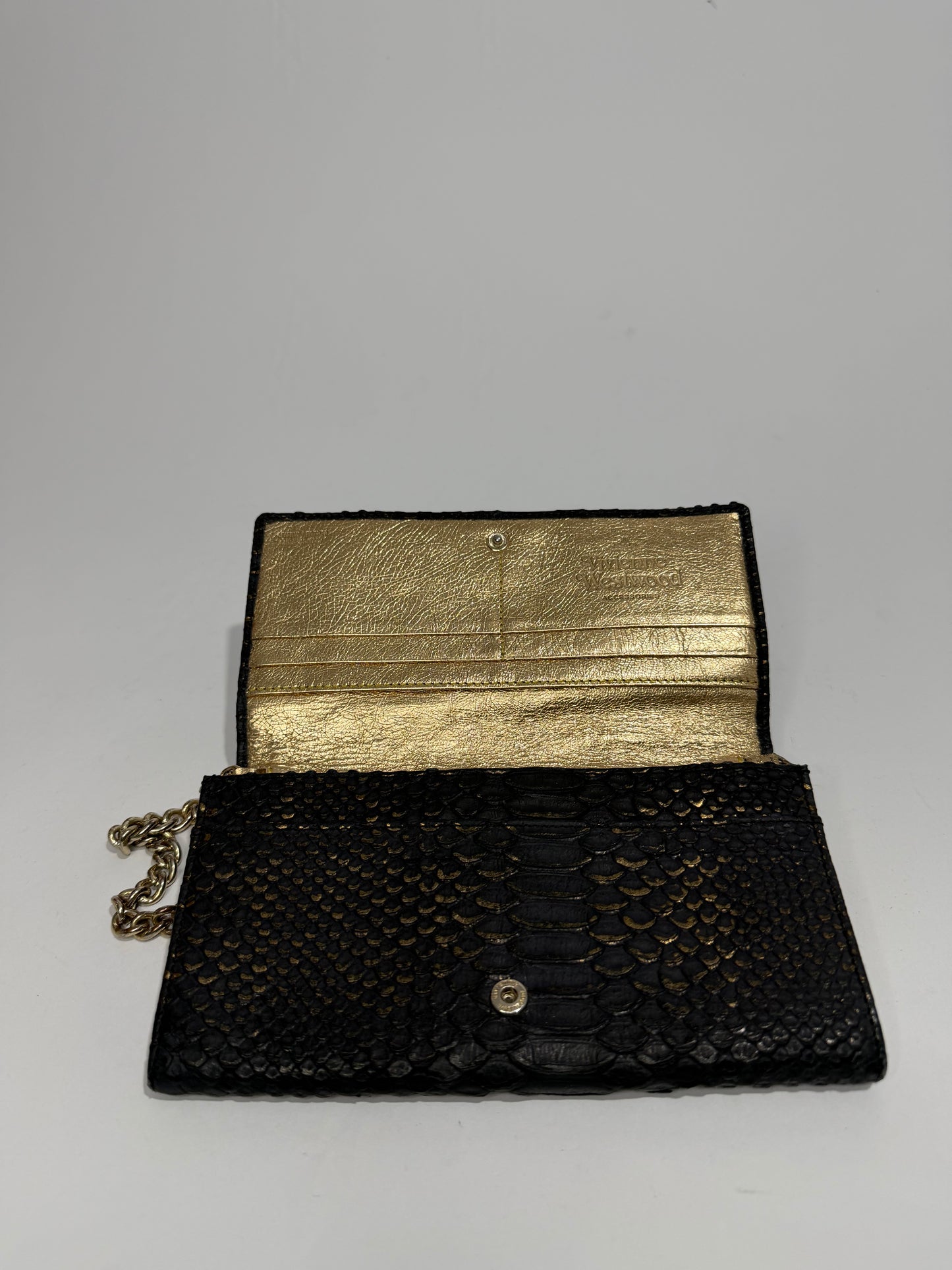 VIVIENNE WESTWOOD
Frilly Snake Patent Wallet In Black