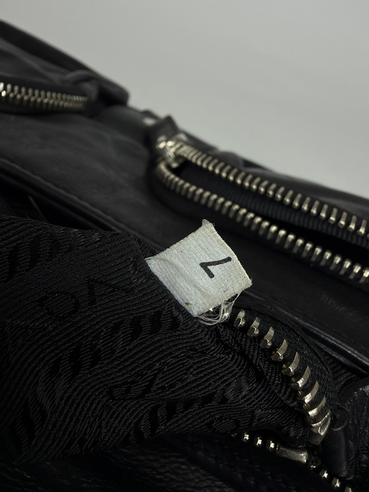 Prada Black Nylon and Leather Buckle Flap Baguette Bag