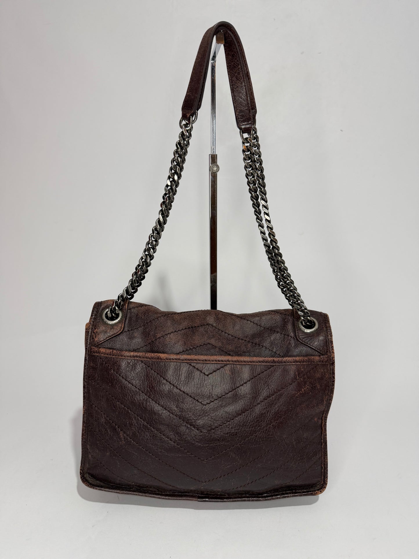 SAINT LAURENT
Crinkled Calfskin Matelasse Monogram Medium Niki Chain Satchel Brown