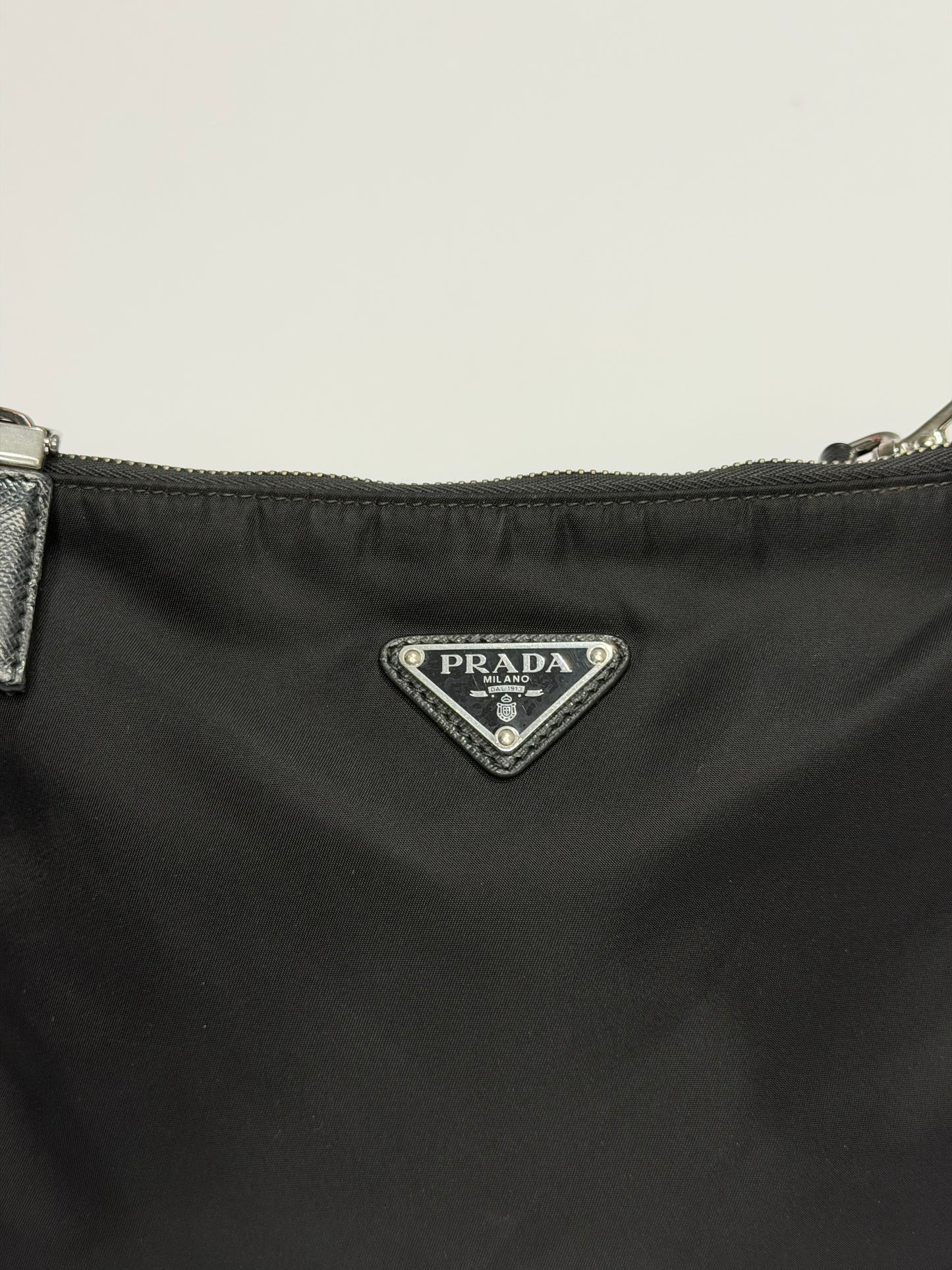 Certified Authentic
PRADA
Re-Nylon Saffiano Re-Edition 2000 Double Zip Crossbody Bag Black