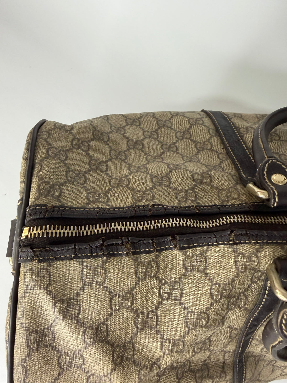 GUCCI
GG Plus Monogram Large Carry On Duffle Bag Brown