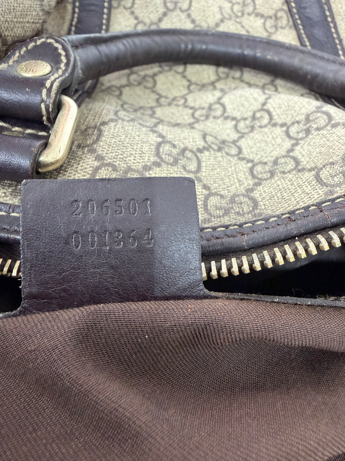 GUCCI
GG Plus Monogram Large Carry On Duffle Bag Brown