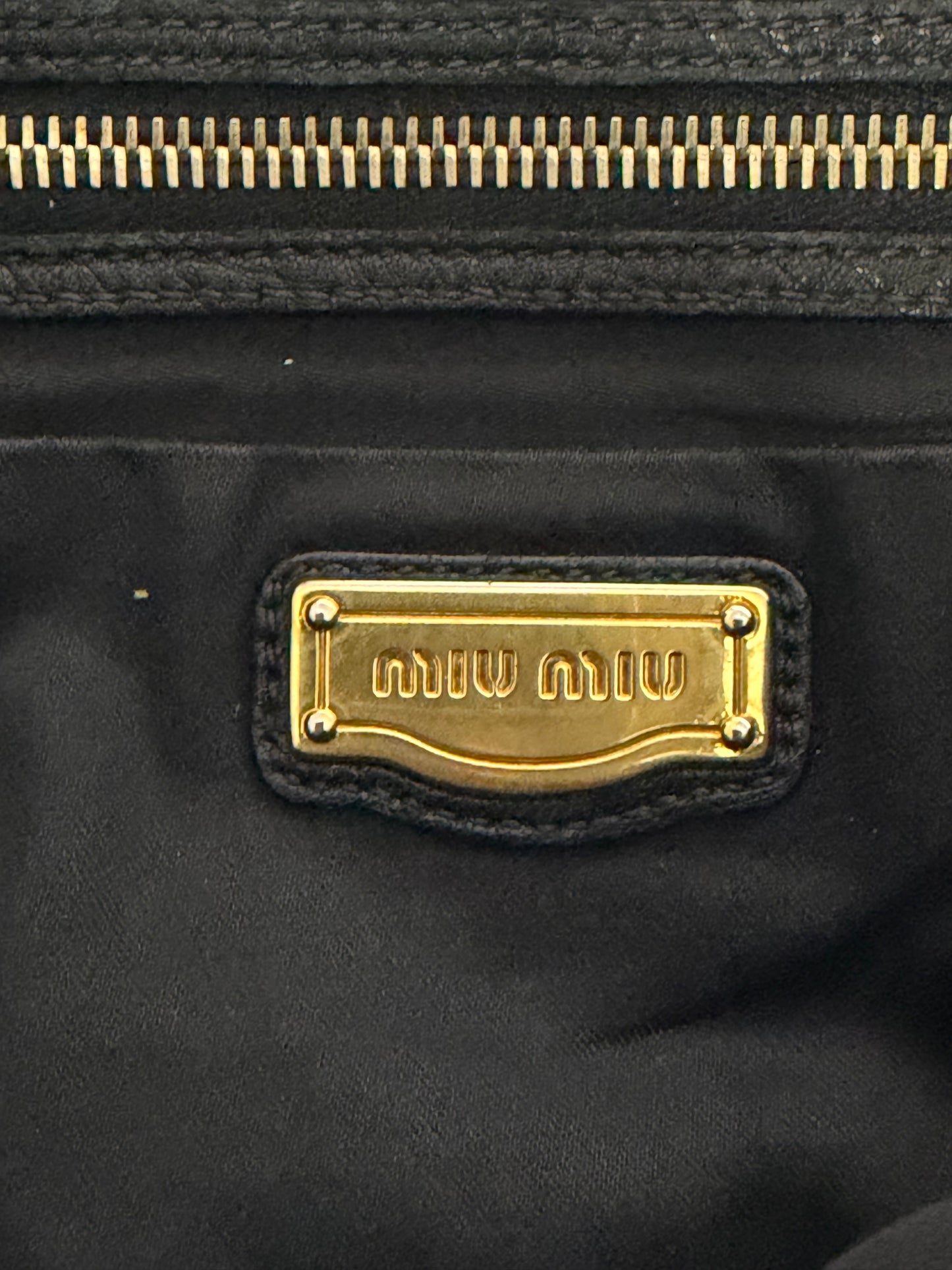 Miu Miu
Leather Weekender Bag