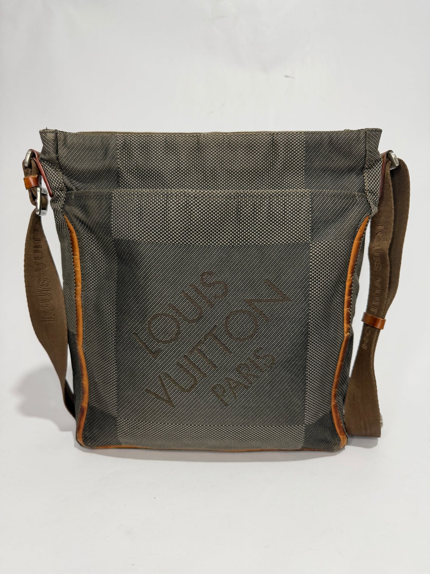 LOUIS VUITTON
Terre Damier Geant Vertical Messenger Bag