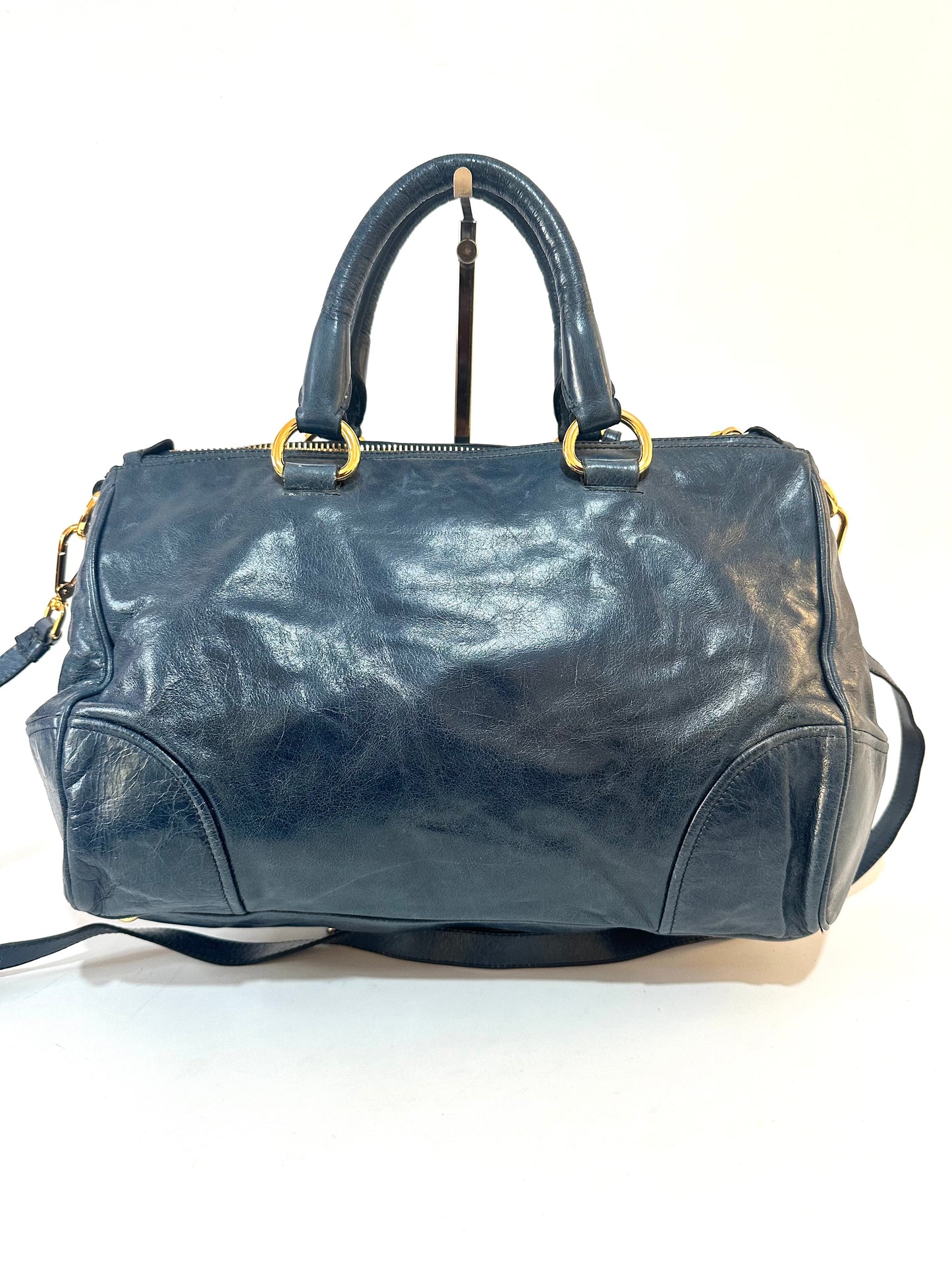 PRADA
Denim Blue Vitello Shine Leather Bauletto Bag