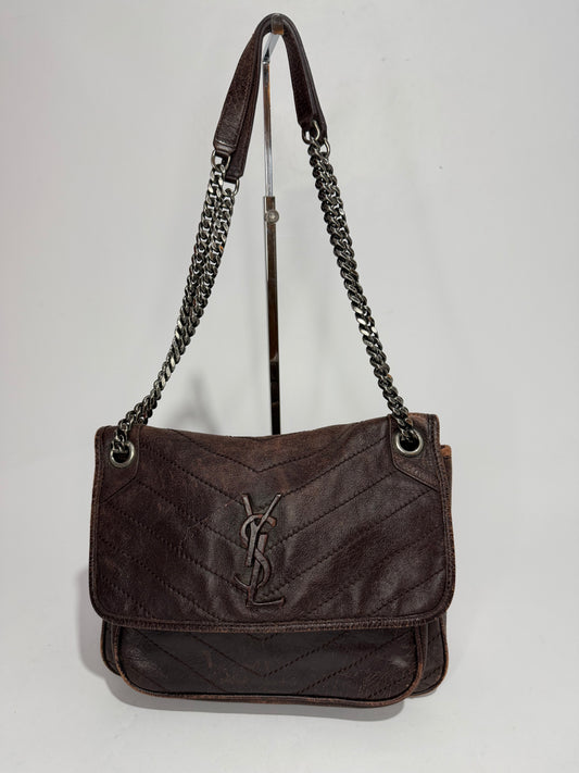 SAINT LAURENT
Crinkled Calfskin Matelasse Monogram Medium Niki Chain Satchel Brown