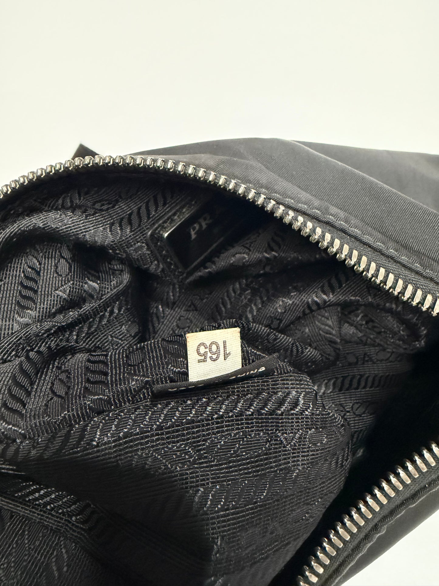 Certified Authentic
PRADA
Re-Nylon Saffiano Re-Edition 2000 Double Zip Crossbody Bag Black