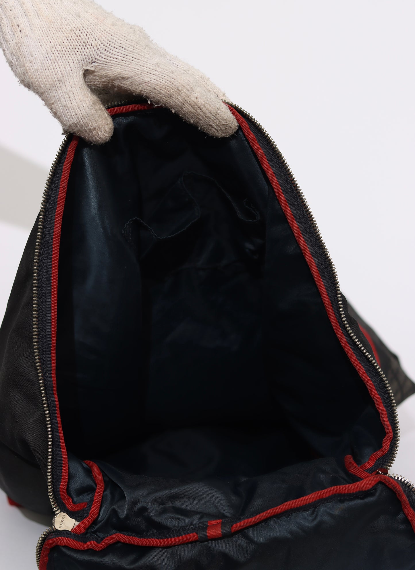 GUCCI
Blue Diamente Nylon Stripe Backpack Bag