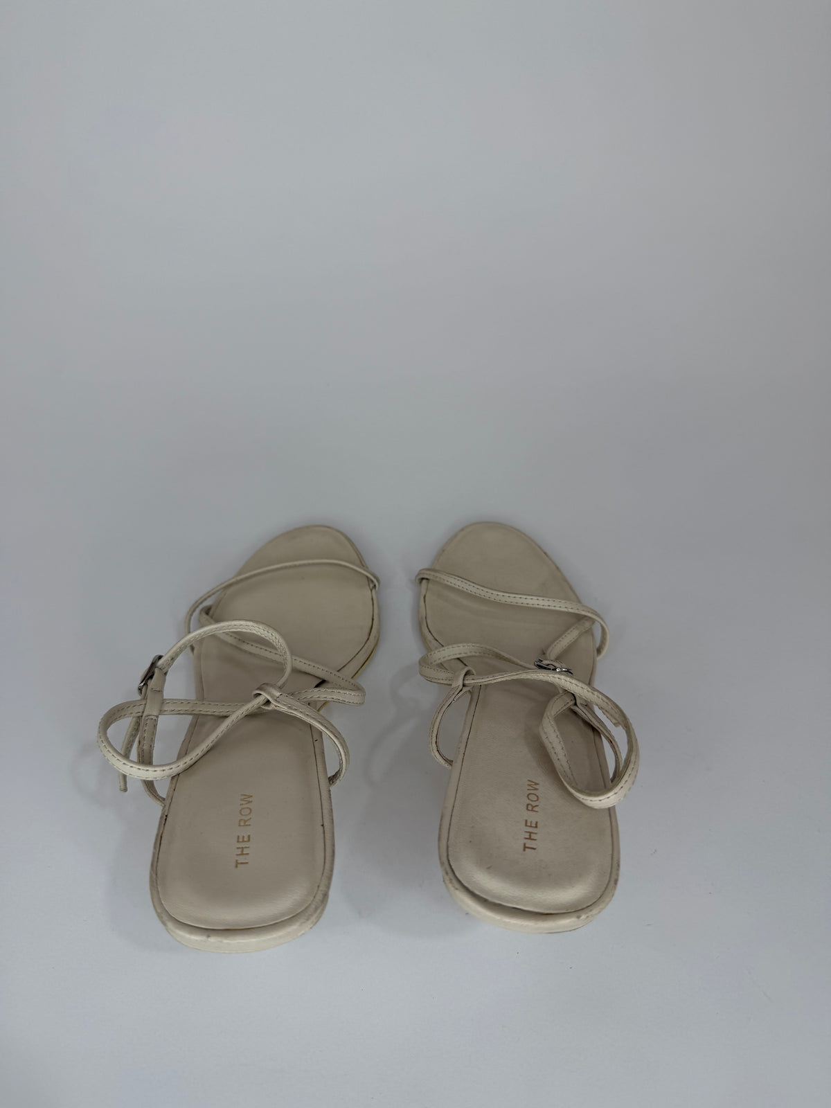 The Row
White Leather Sandals
Women's Size 37 EU/ 7 US/ 4 UK