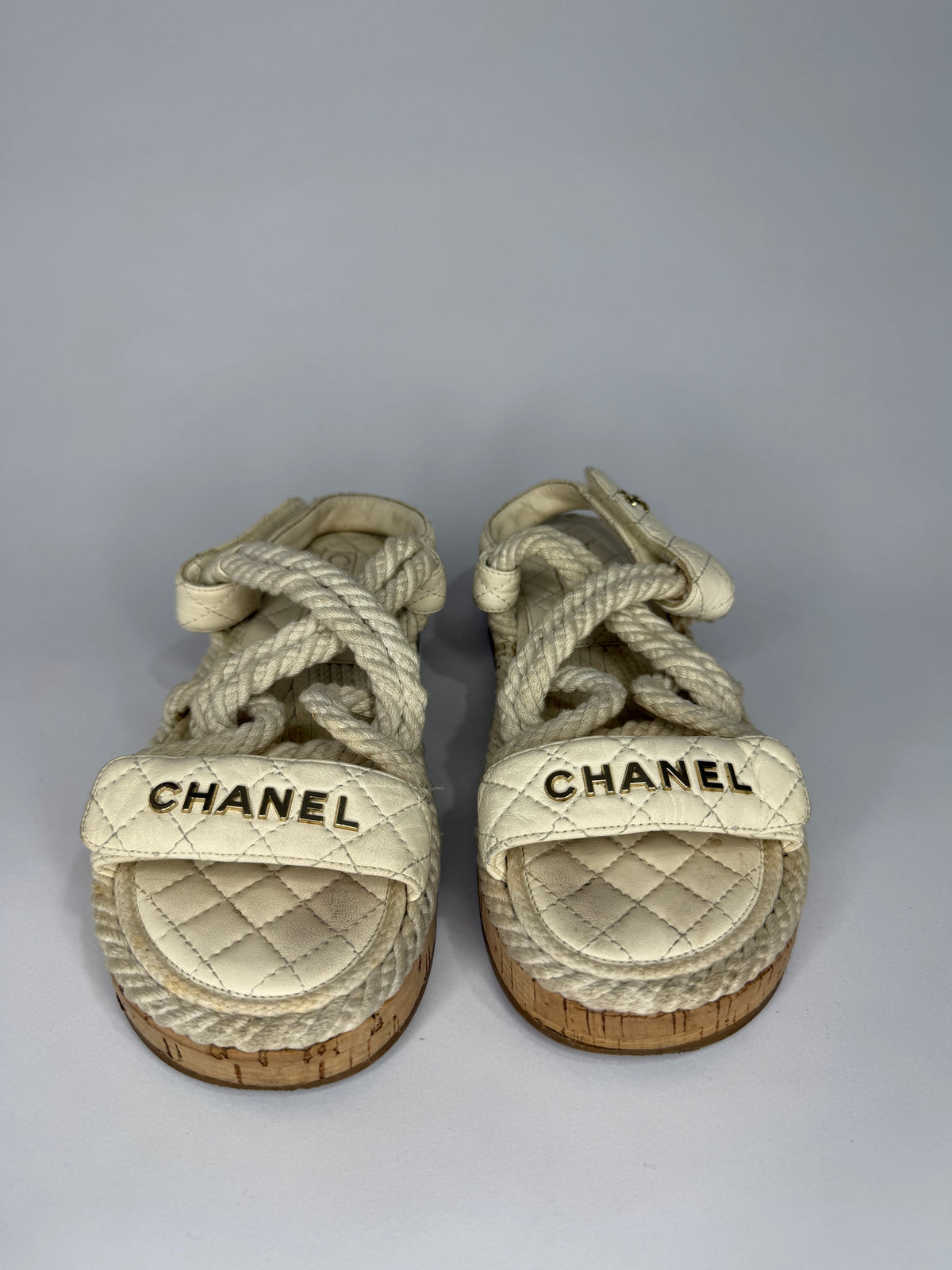CHANEL
Cord Lambskin Quilted Logo Sandals White Size 37 EU/ 4 UK/ 7 US