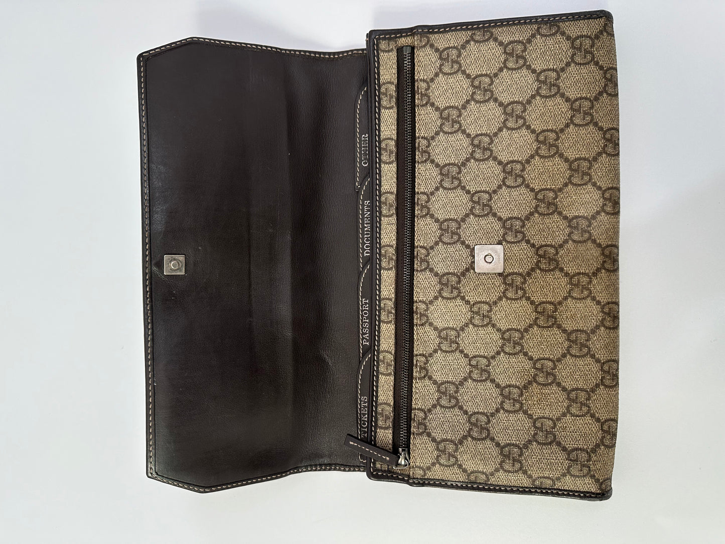 GUCCI 
GG Supreme Monogram Clutch Document Holder Brown