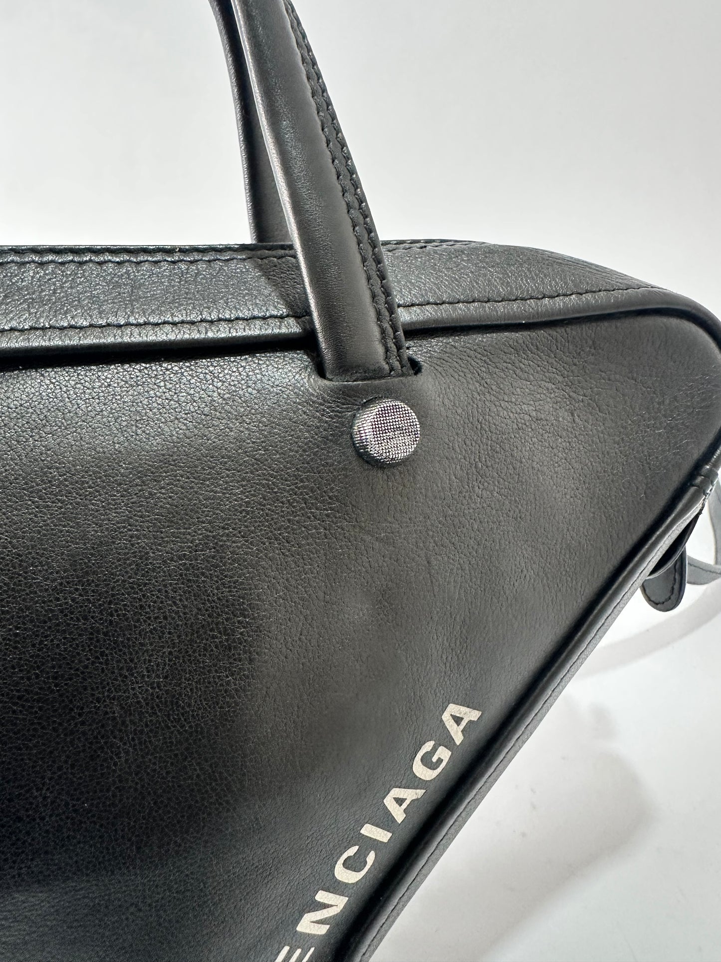 BALENCIAGA 
Calfskin XS Triangle Duffle Black