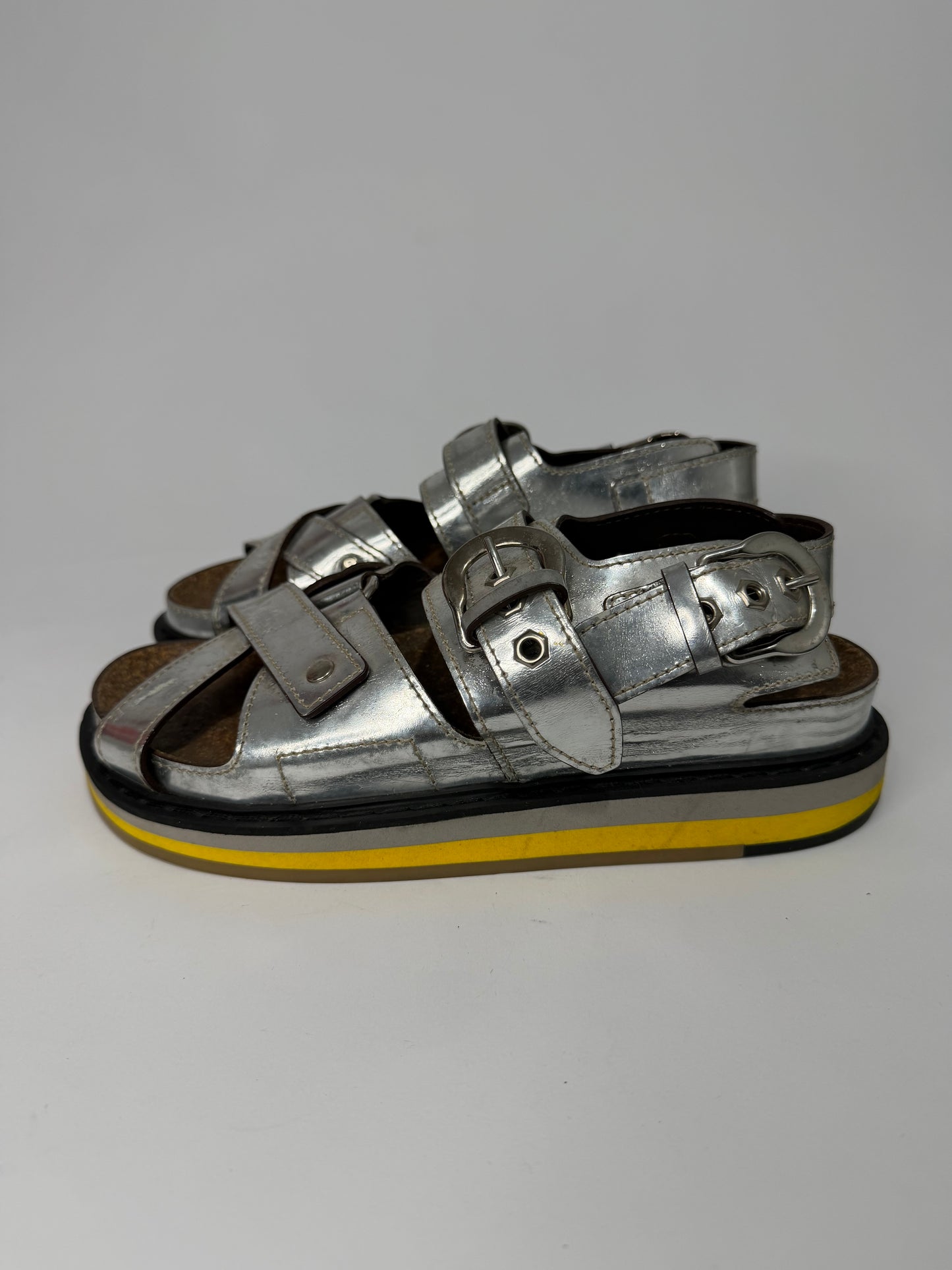 Maison Margiela
Patent Leather Slingback Sandals