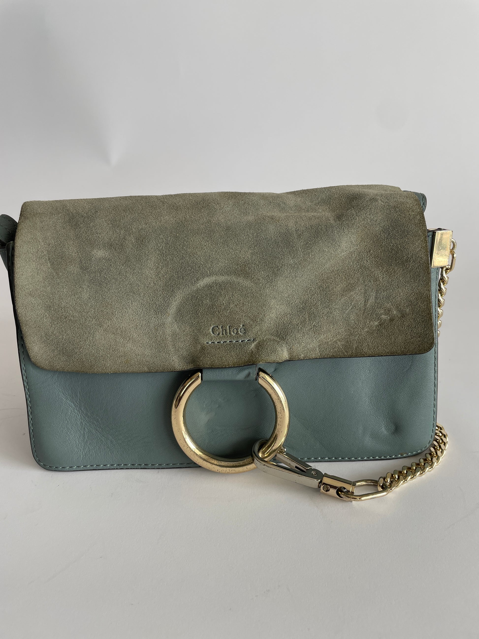 chloe mini faye backpack cloudy blue Calfskin Day Shoulder Bag 1225413 FASHIONPHILE Crafted from smooth leather and suede in a light washed blue hue Chloe Faye Suede Cloudy Blue